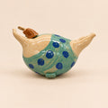 Martina · turquesa con lunares azules