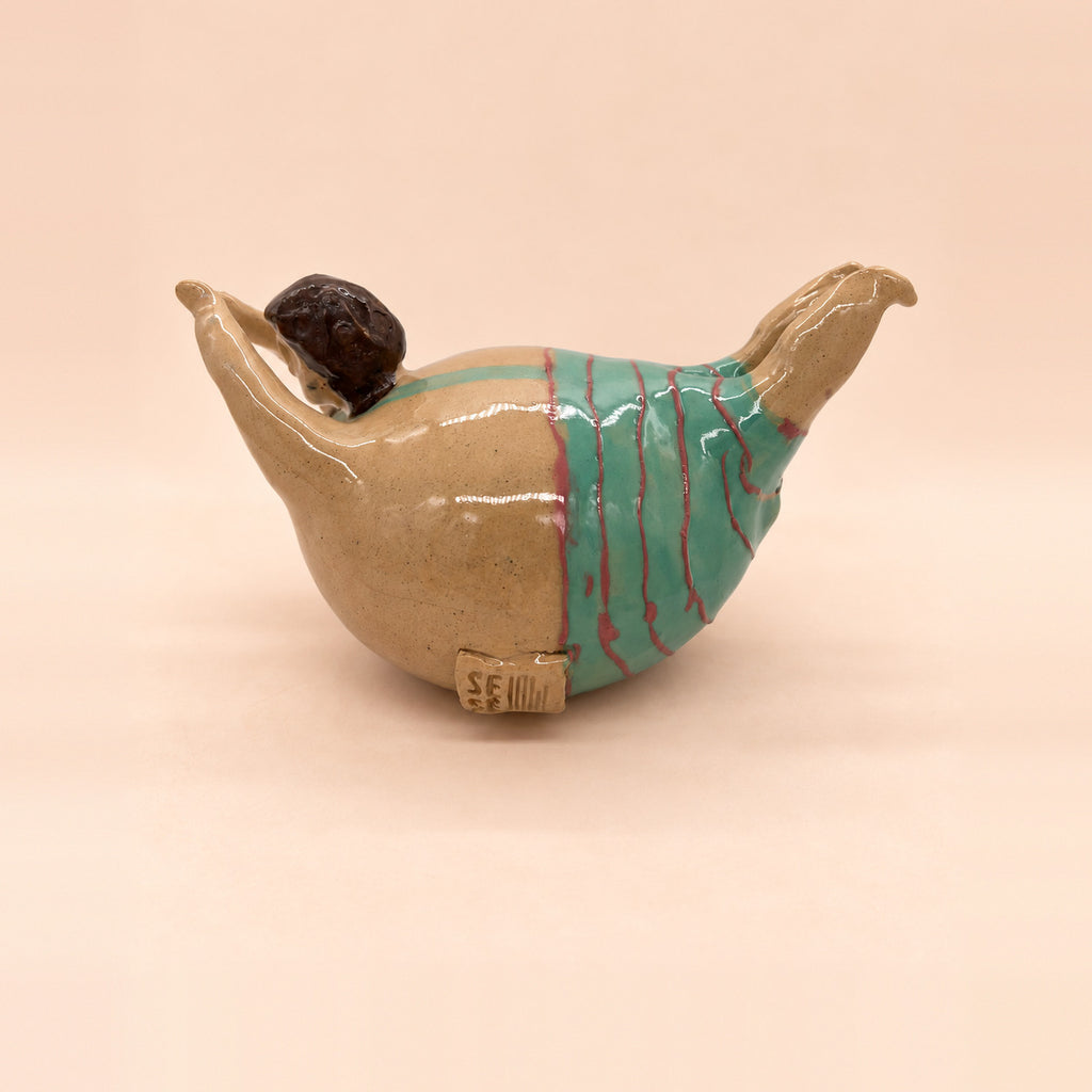 Bañista de rayas turquesa, de la pareja